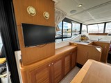 Saloon with TV and sofa opposite